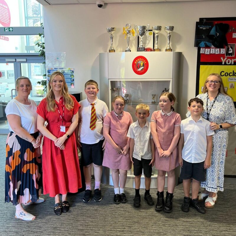 Kate Dearden MP with pupils and staff